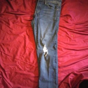 Ripped distressed cuffed mid calf capris.